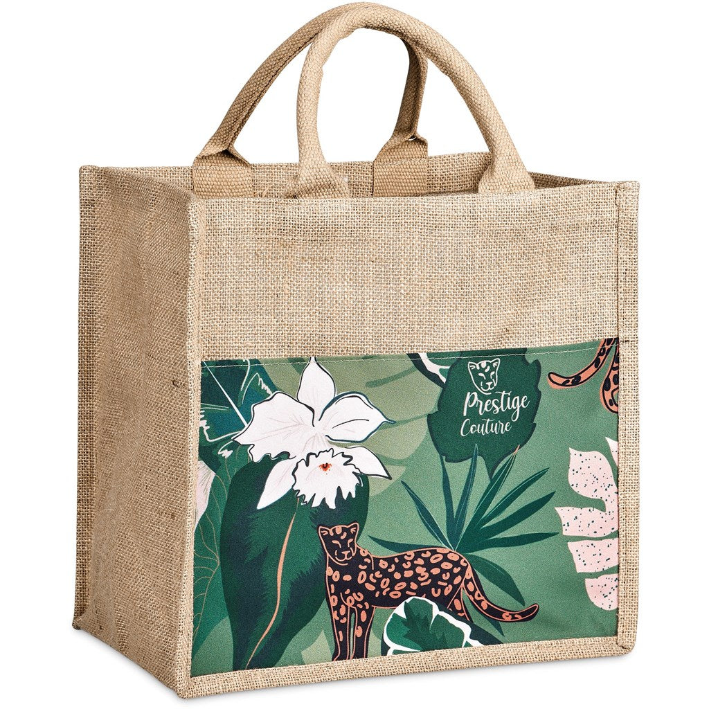 Jute bag with a tropical design featuring a leopard and leaves on a green background.

