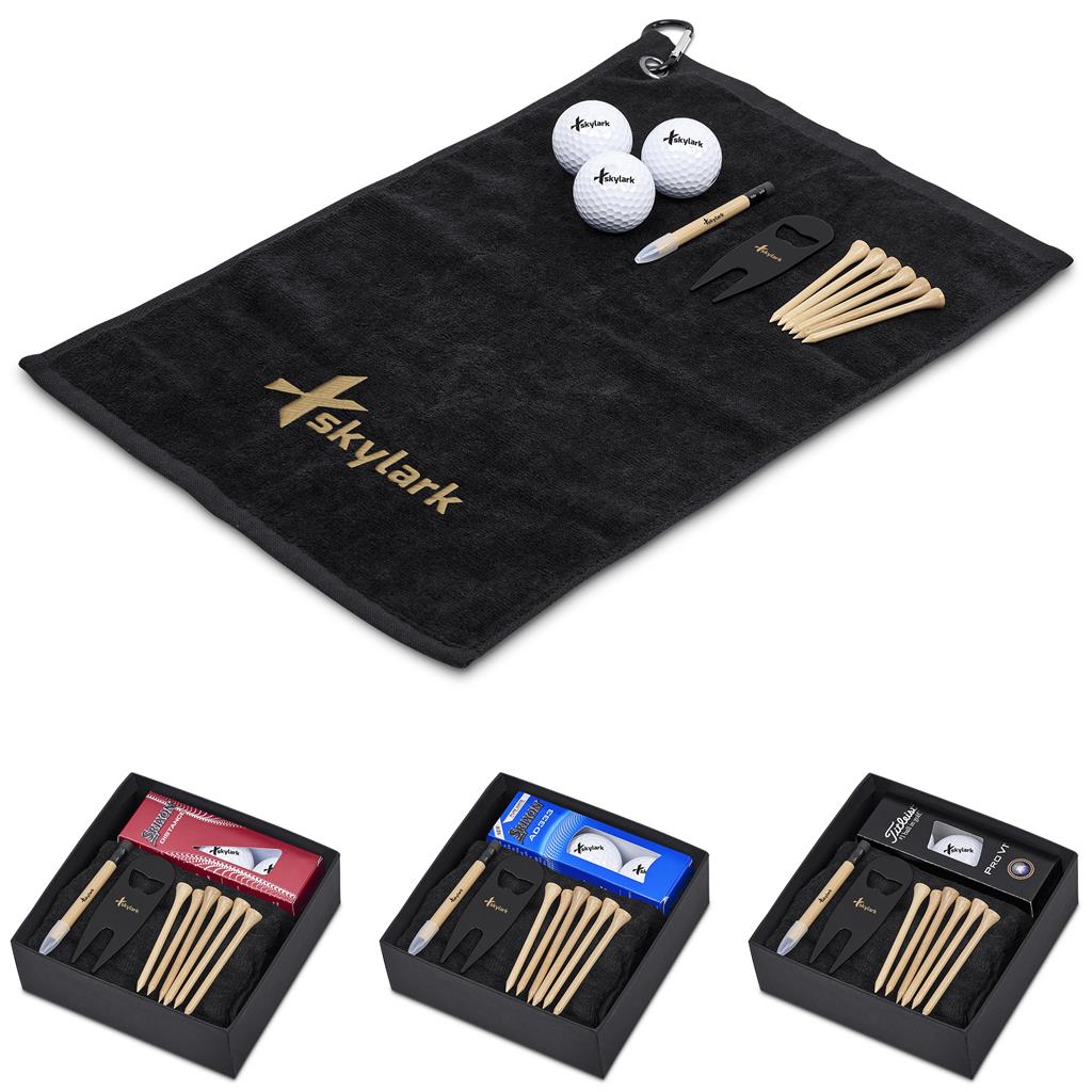Golf accessories including golf balls, tees, and towel with Skylark branding on a white background

