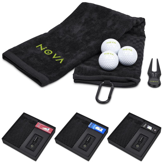 Golf towel with golf balls, divot tool, and golf tees on a white background

