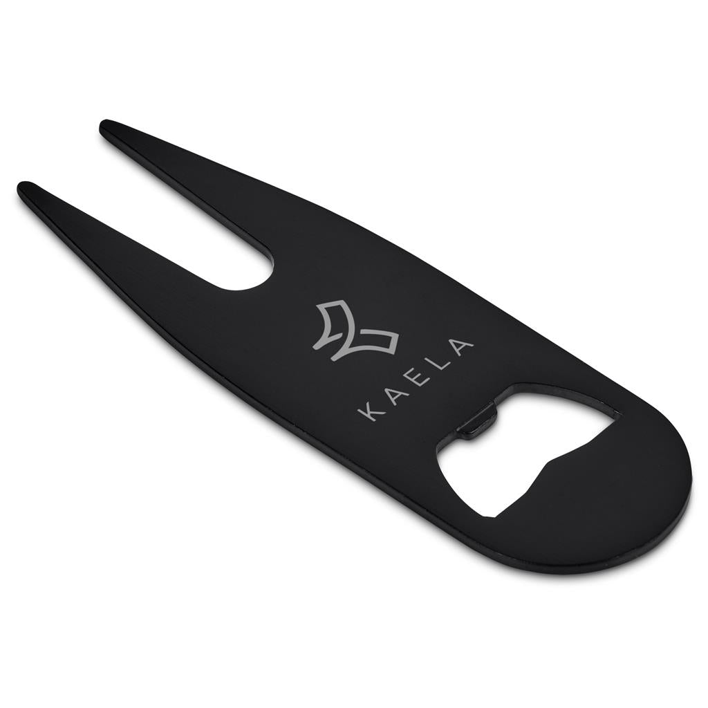 Black divot tool with bottle opener feature and 'Kaela' branding on a white background

