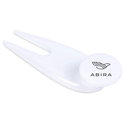 White plastic divot tool with 'ABIRA' branding on a white background

