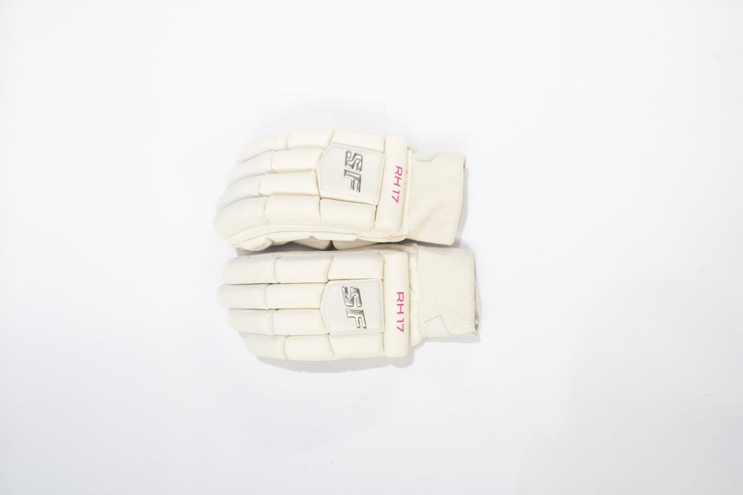 Pair of white cricket gloves with 'SR' branding on a white background

