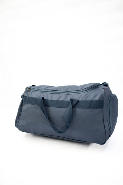 Blue duffel bag on a white background

