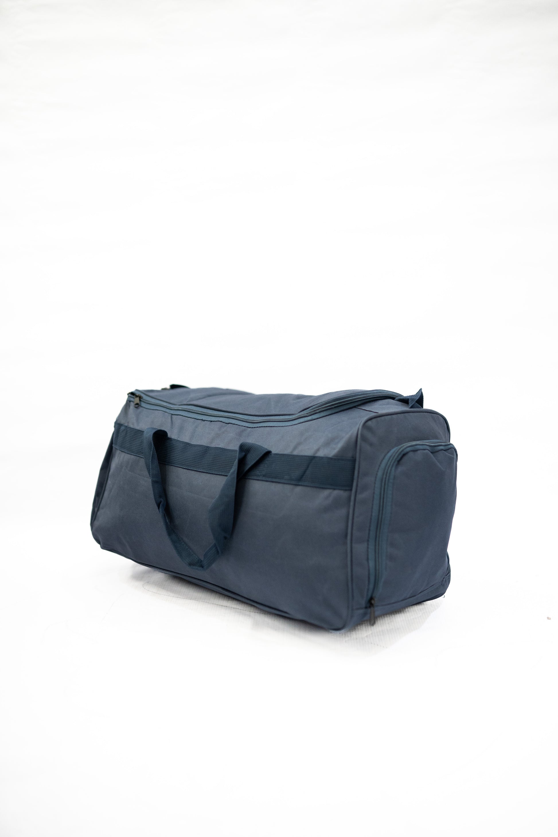 Navy blue duffel bag on a white background

