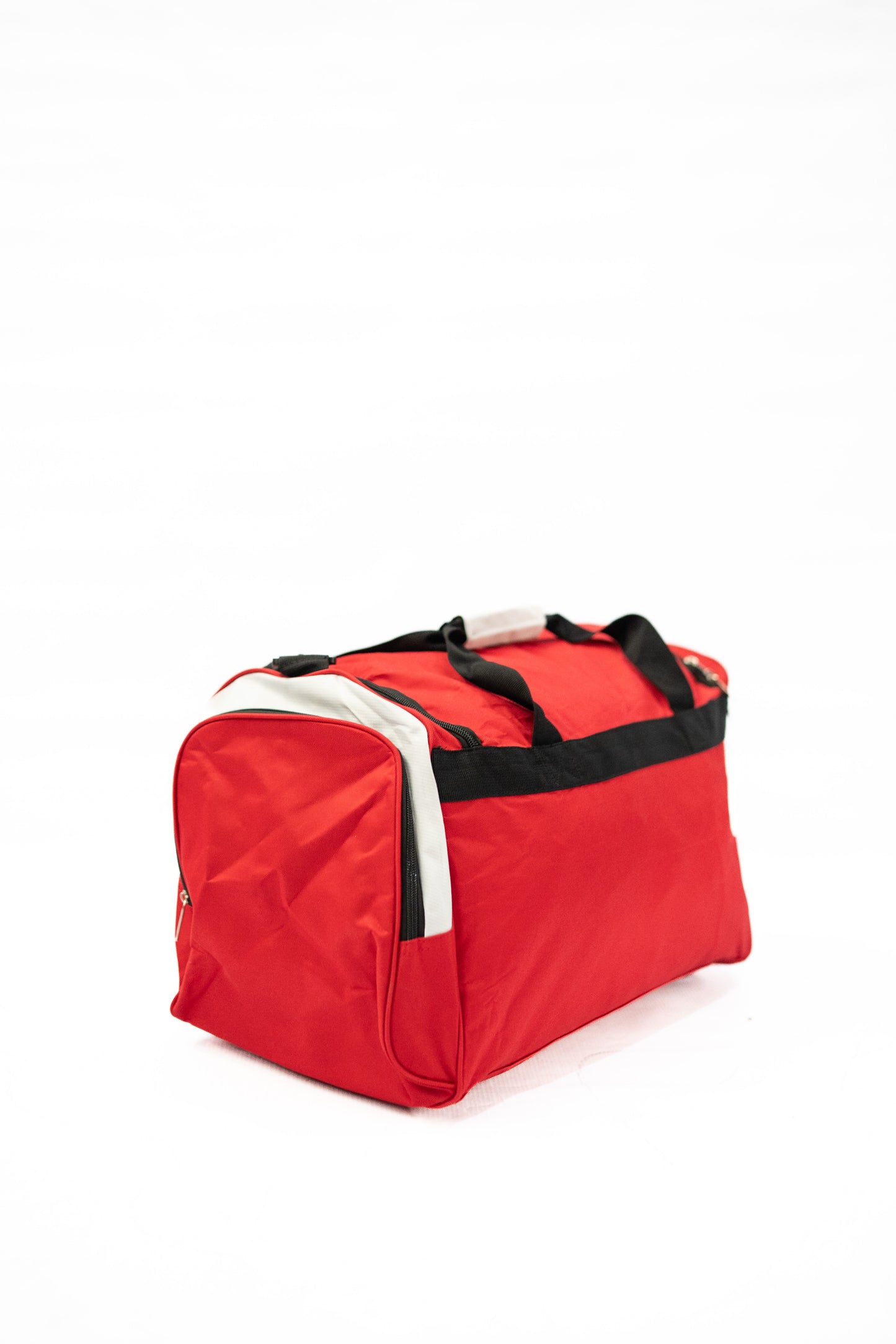 Red duffel bag with black straps on a white background

