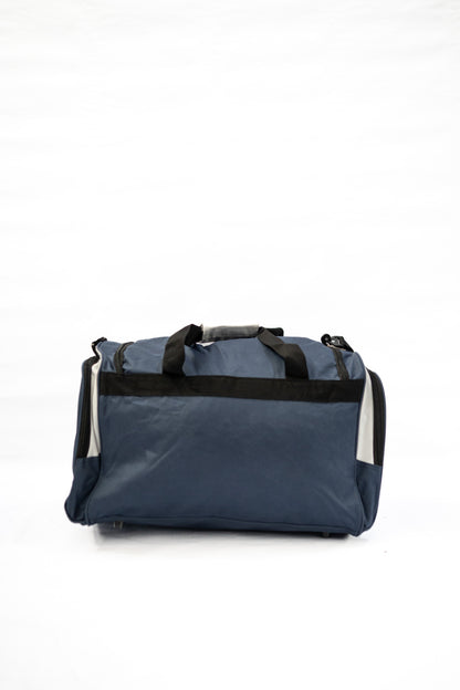 Blue duffel bag with black handles on a white background

