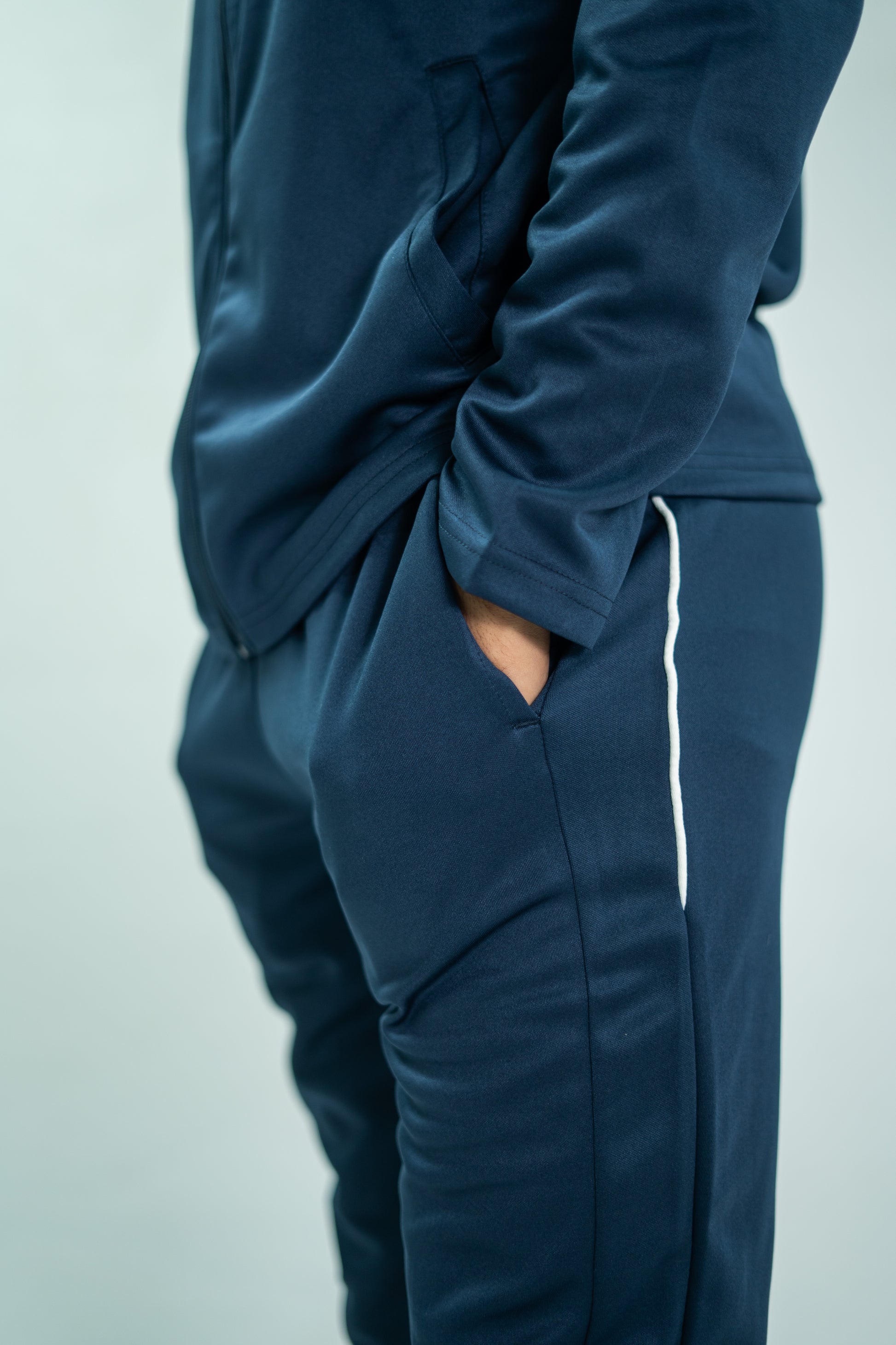 Navy blue outfit with a blurred background

