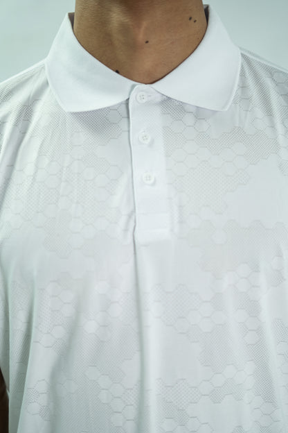 White polo shirt with a subtle pattern on a plain background

