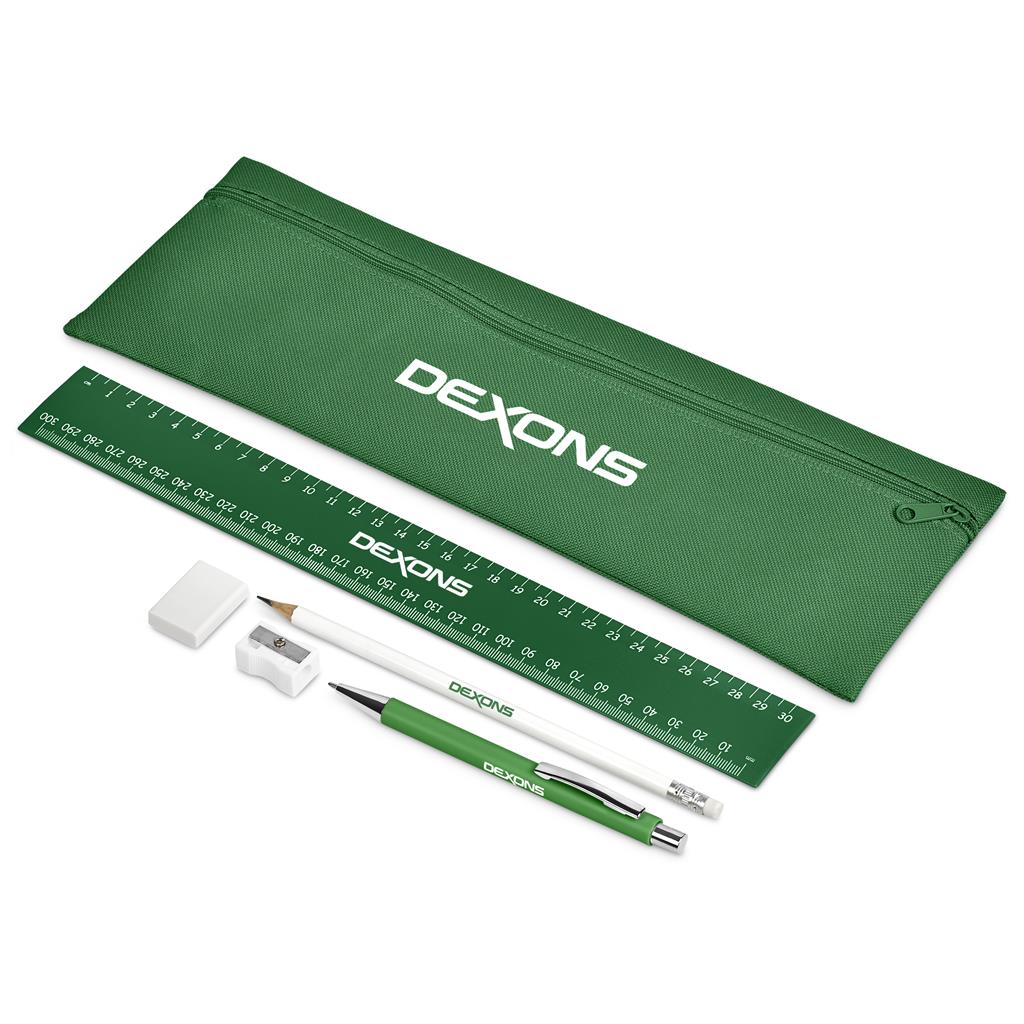 Green stationery set with ruler, pencil, eraser, and pen on a white background

