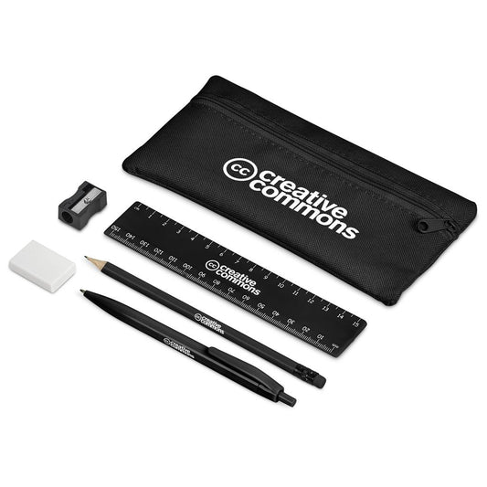 Stationery set with ruler, pencils, eraser, and sharpener on a white background

