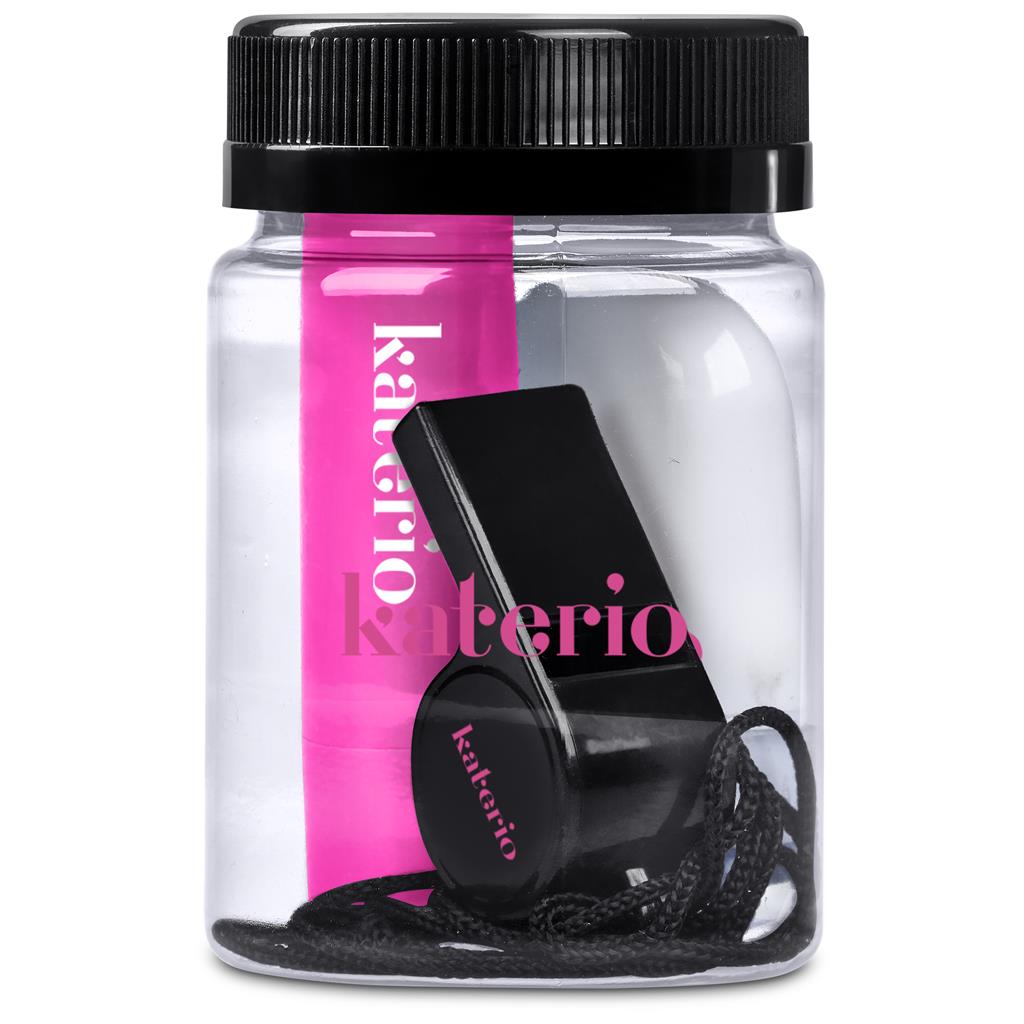 Black whistle in a clear container with pink label on a white background

