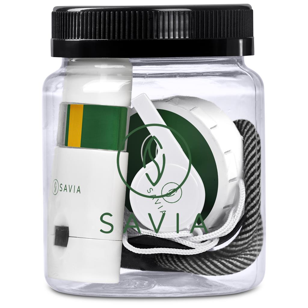 Jar containing a white product with black text and a green stripe, branded 'Savia'.

