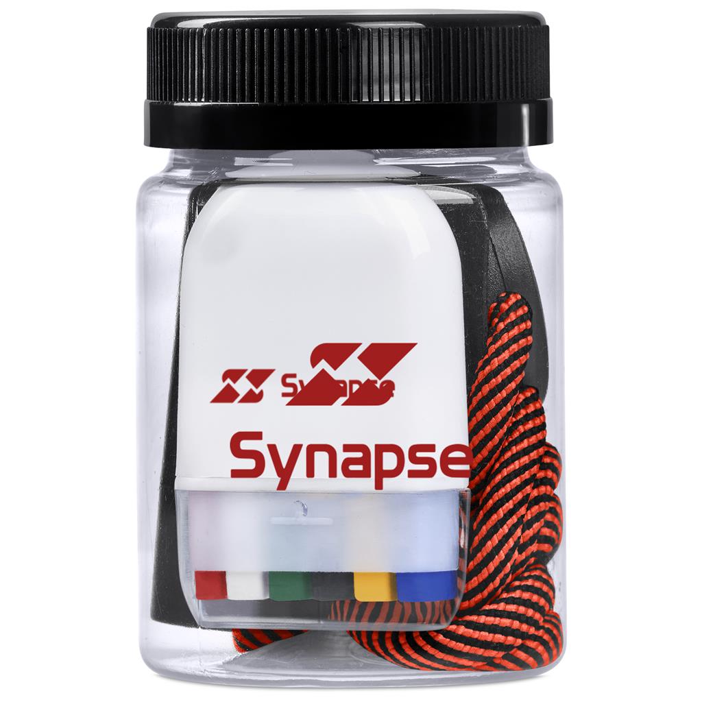 Clear container with black lid containing colorful elastic bands, branded 'Synapse'.

