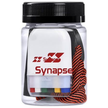 Clear container with black lid containing colorful elastic bands, branded 'Synapse'.

