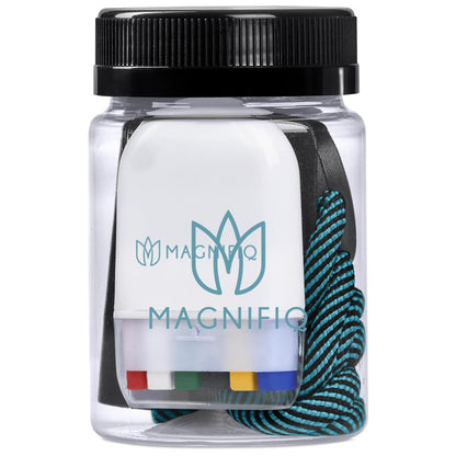 Clear container with black lid containing colorful markers and a blue hair tie, branded 'Magnifico'.

