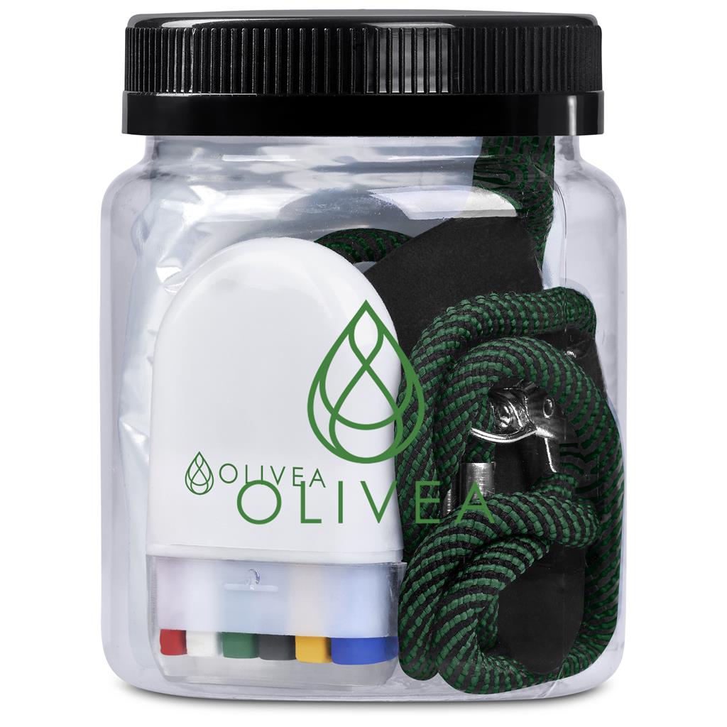 Clear container with black lid containing various items, including a white bottle labeled 'Olivea' and green rope.

