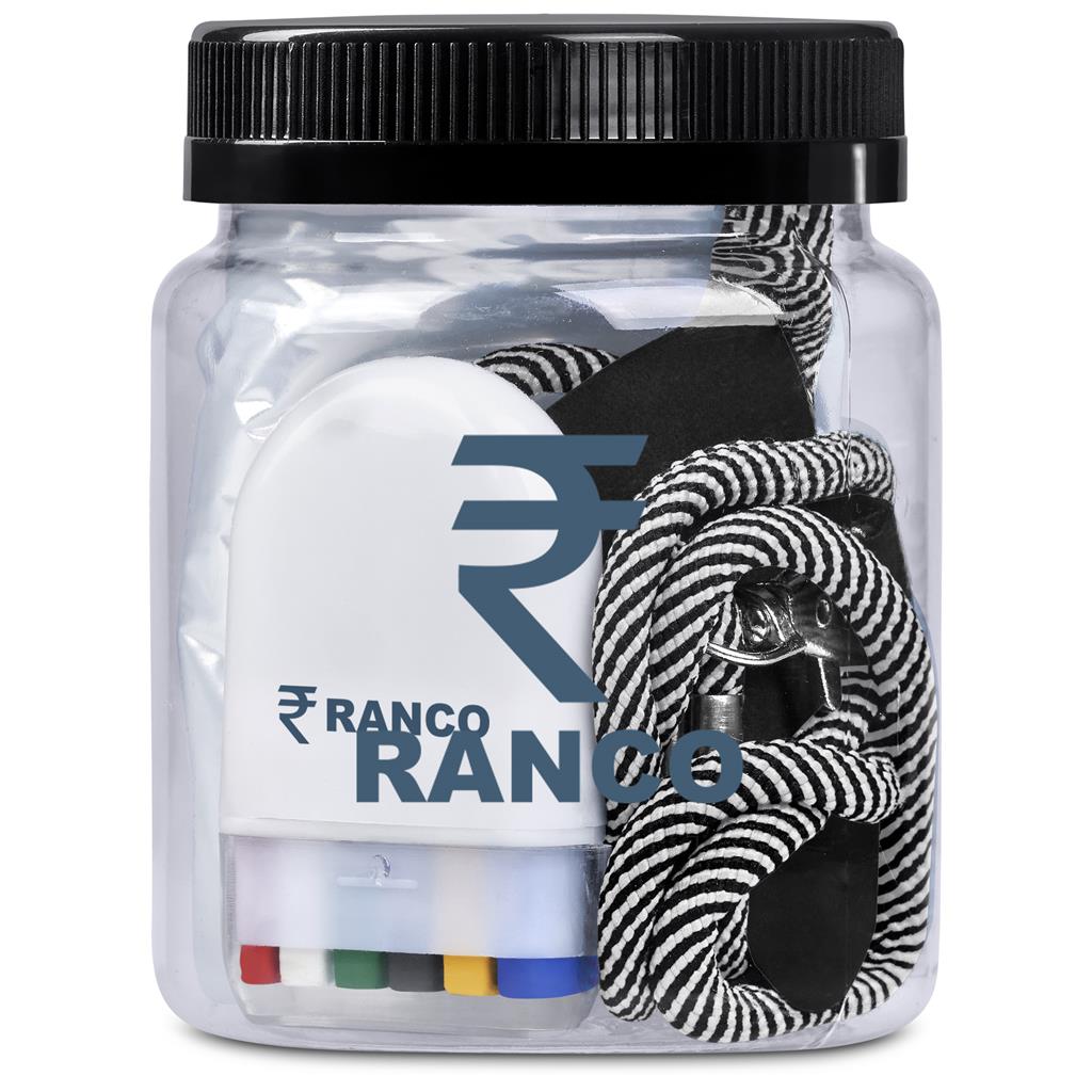 Clear container with Ranco branded items including a white ball, black and white striped bandage, and colorful markers.

