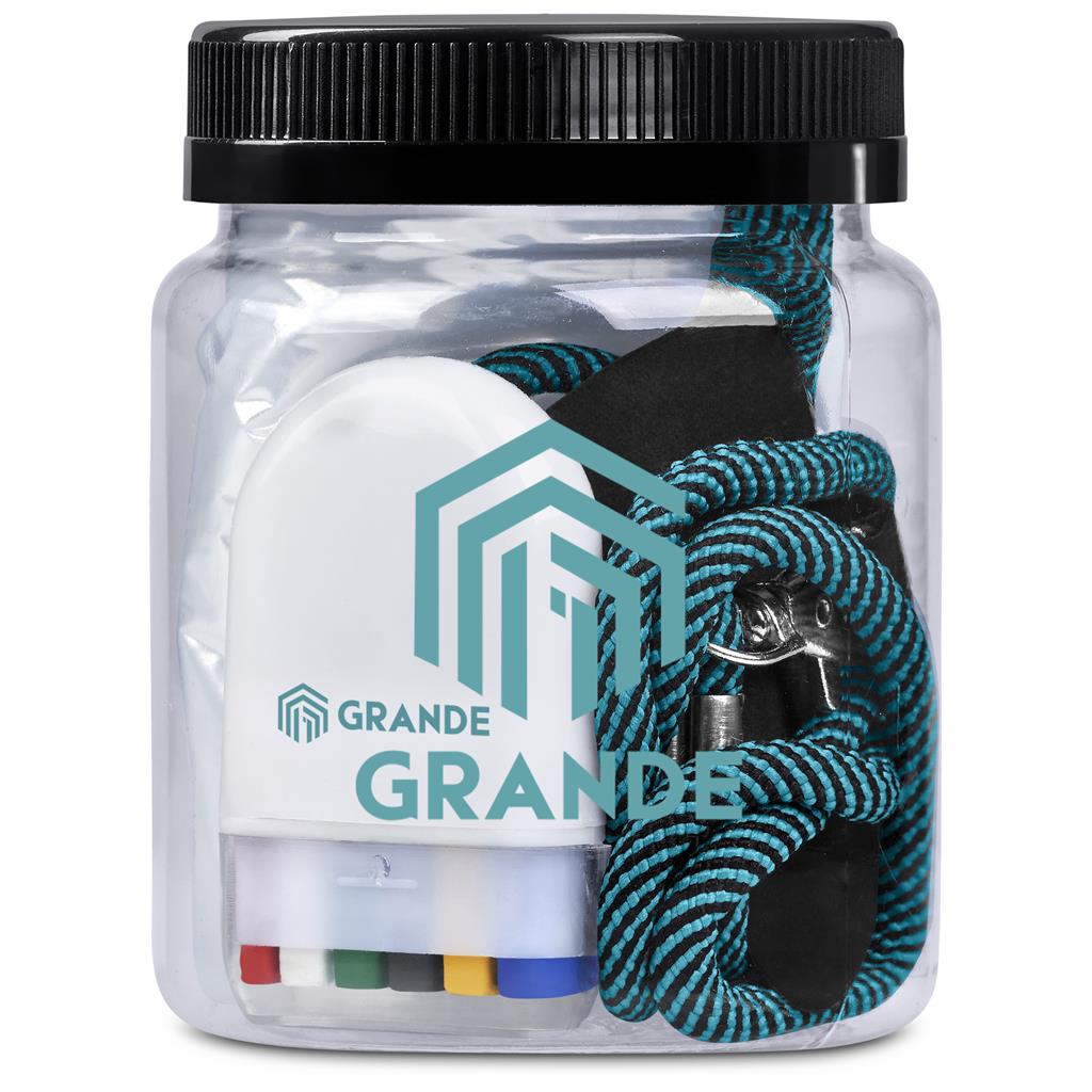 Clear container with earbuds, lanyard, and colorful markers branded with 'Grande'.


