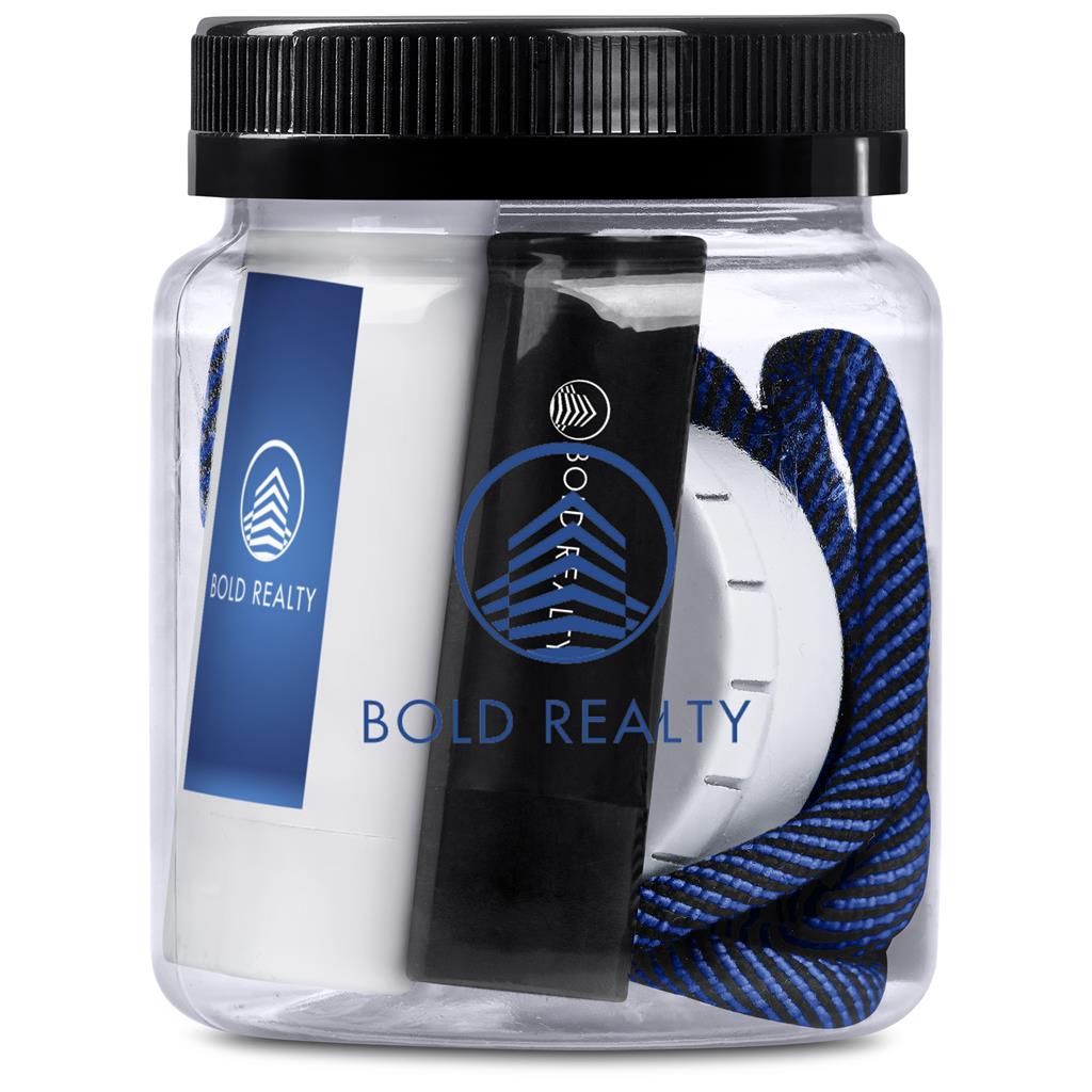 Clear container with black lid containing a white ball, blue rope, and black tool, branded 'Bold Realty'.

