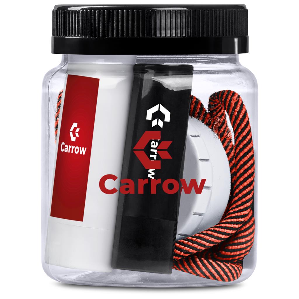 Clear container with Carrow branded items including a white ball, black and red striped rope, and a black and red object.

