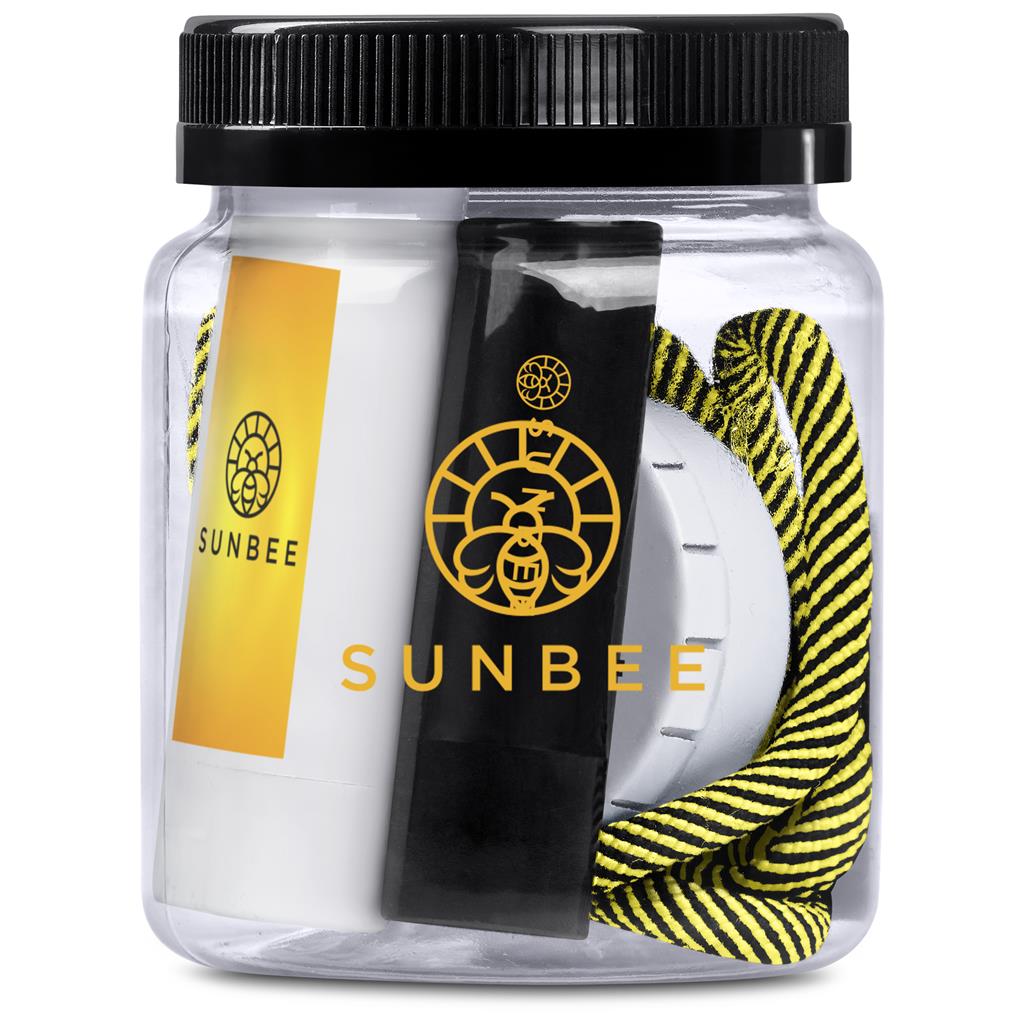 Clear container with Sunbee branded items including a black card and yellow and black striped band.

