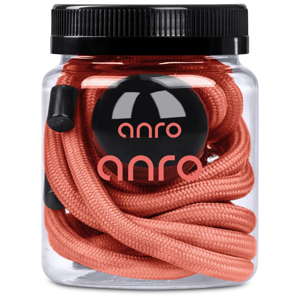 Jar of coral-colored shoelaces with 'anra' branding on a white background


