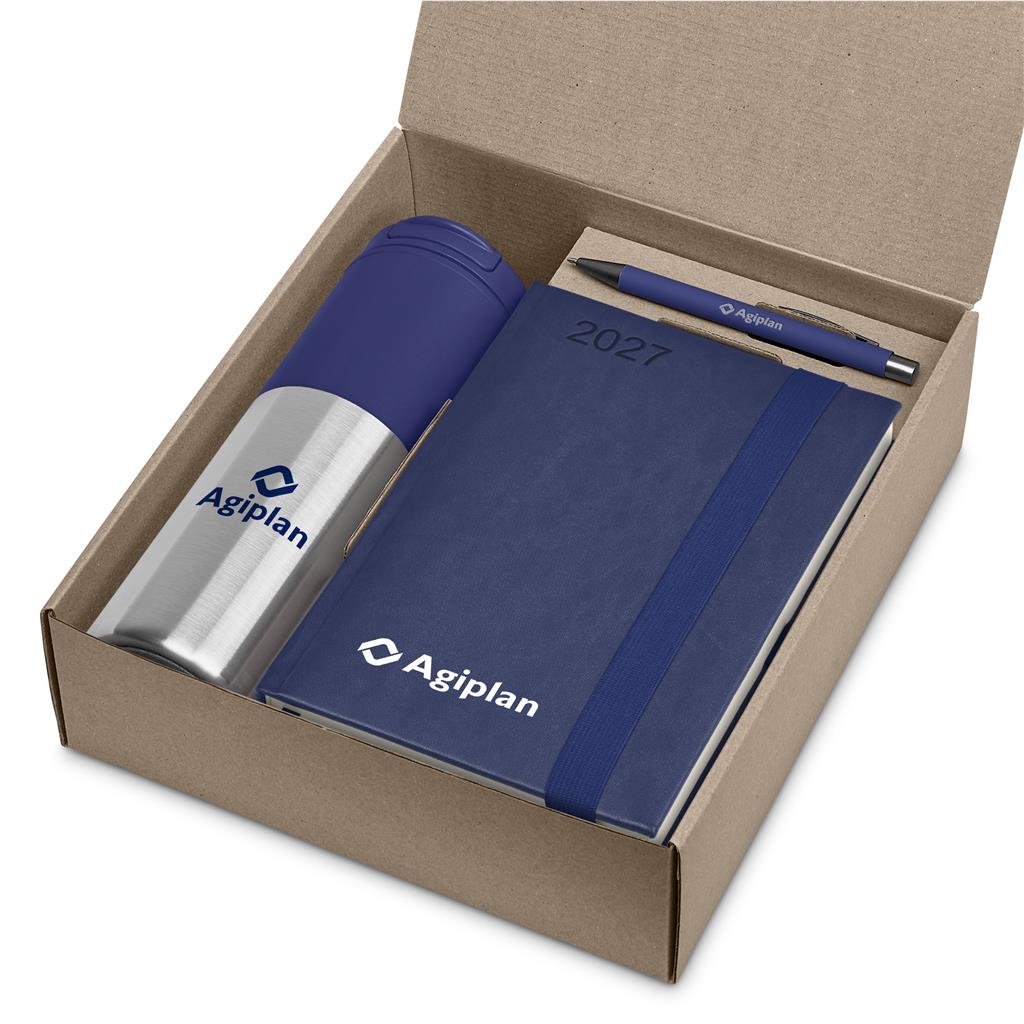 An open kraft paper gift box containing an insulated stainless steel tumbler with a dark blue lid, a navy blue 2027 planner, and a matching blue pen. The items are branded with the 'Agiplan' logo.

