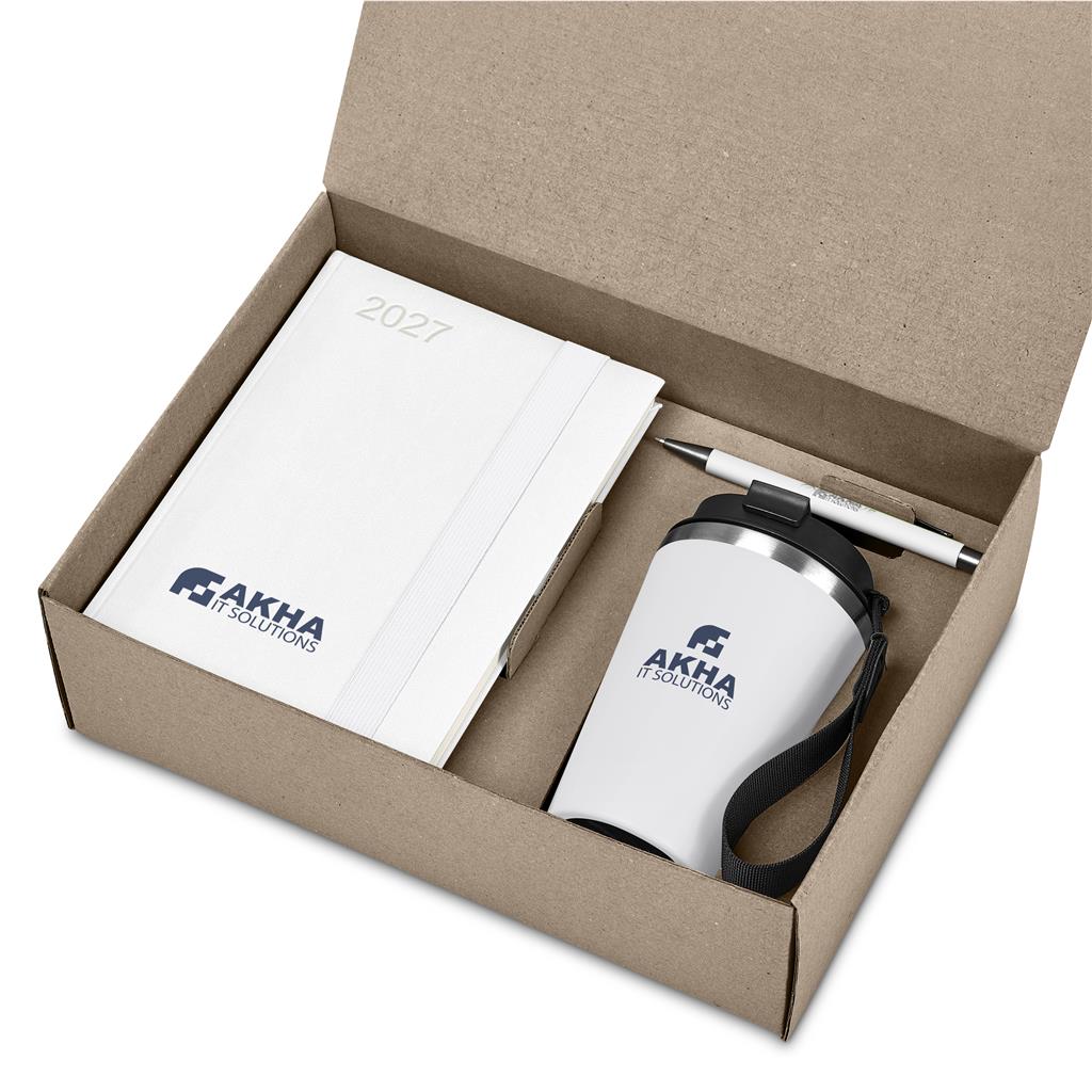 A branded gift set in a brown cardboard box containing a white 2027 notebook, a white insulated travel tumbler with a black lid and wrist strap, and a white pen. The items are printed with the AKHA SOLUTIONS logo.

