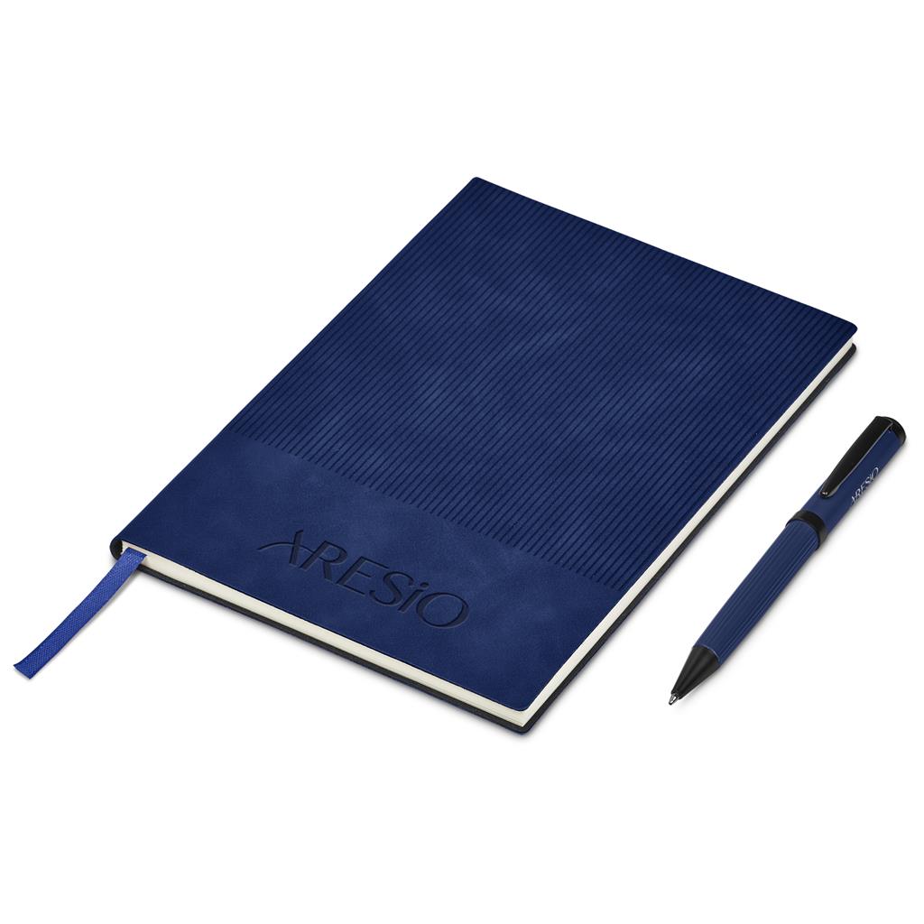 Blue notebook with a pen on a white background

