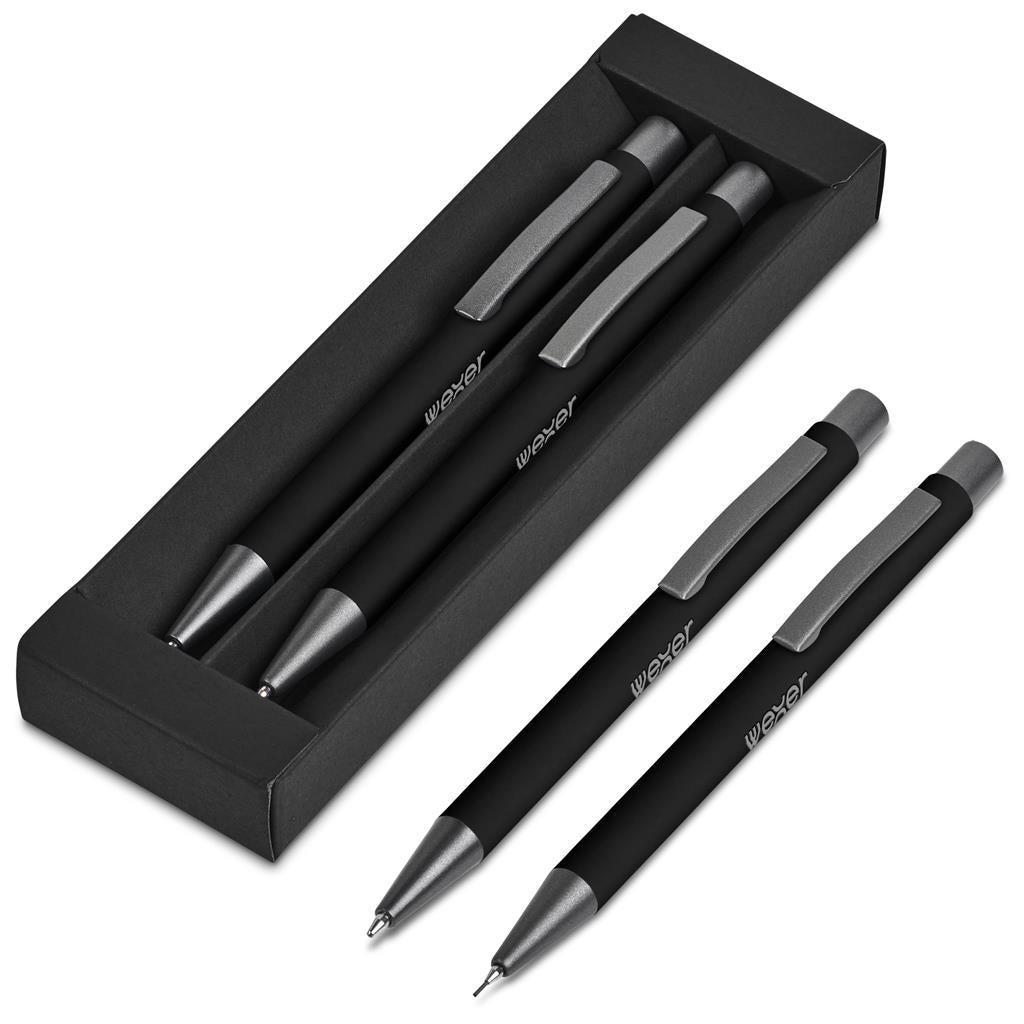 Set of black pens with silver accents on a white background

