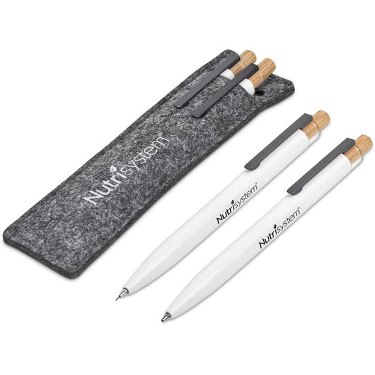 Set of white pens with gray accents and wooden tips, accompanied by a gray carrying case featuring 'Nutrisystem' branding.

