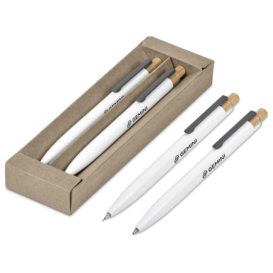 Set of white pens with black accents in a cardboard box on a white background


