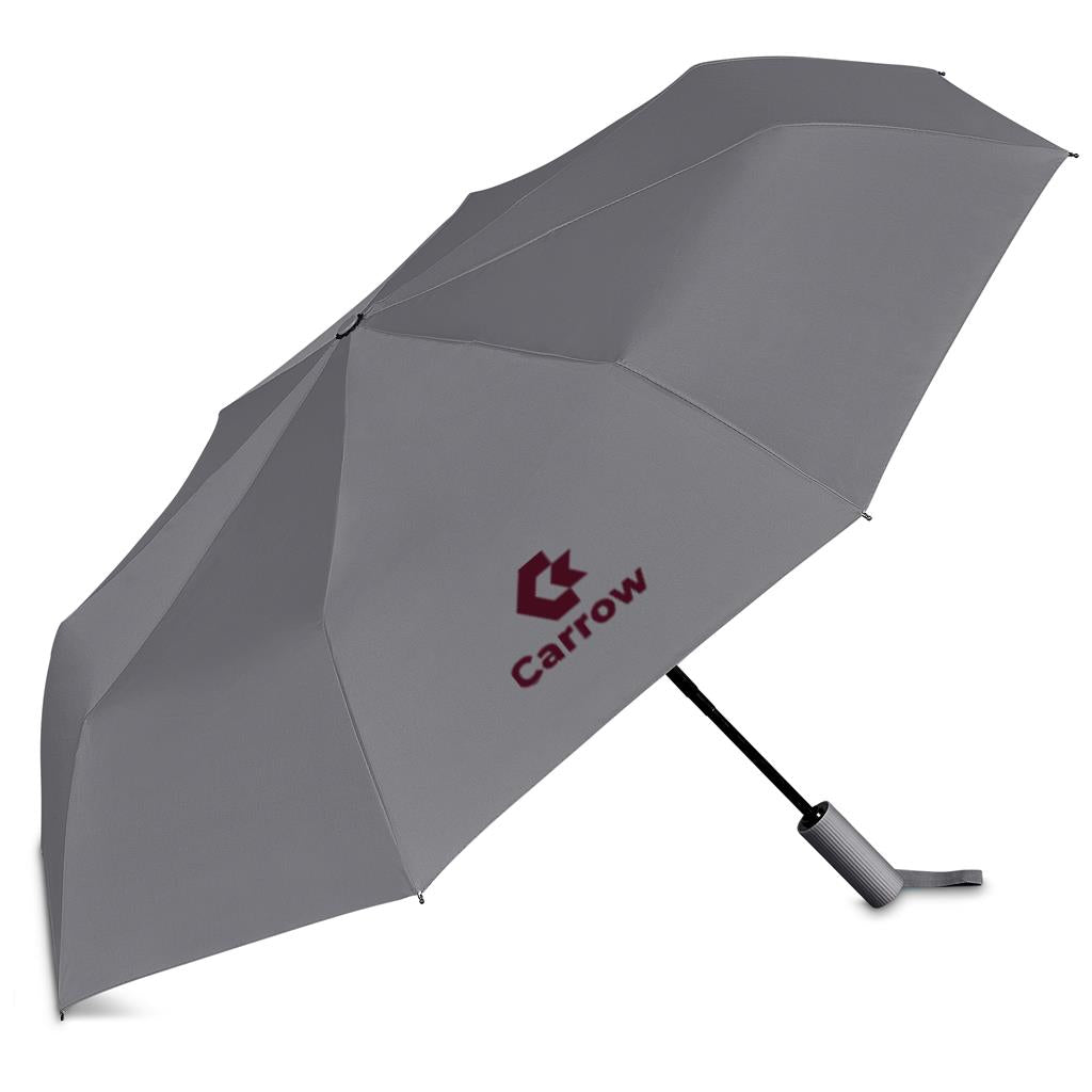 A gray folding umbrella shown open on a white background, with the Carflow logo printed in dark red on the canopy and a black handle.

