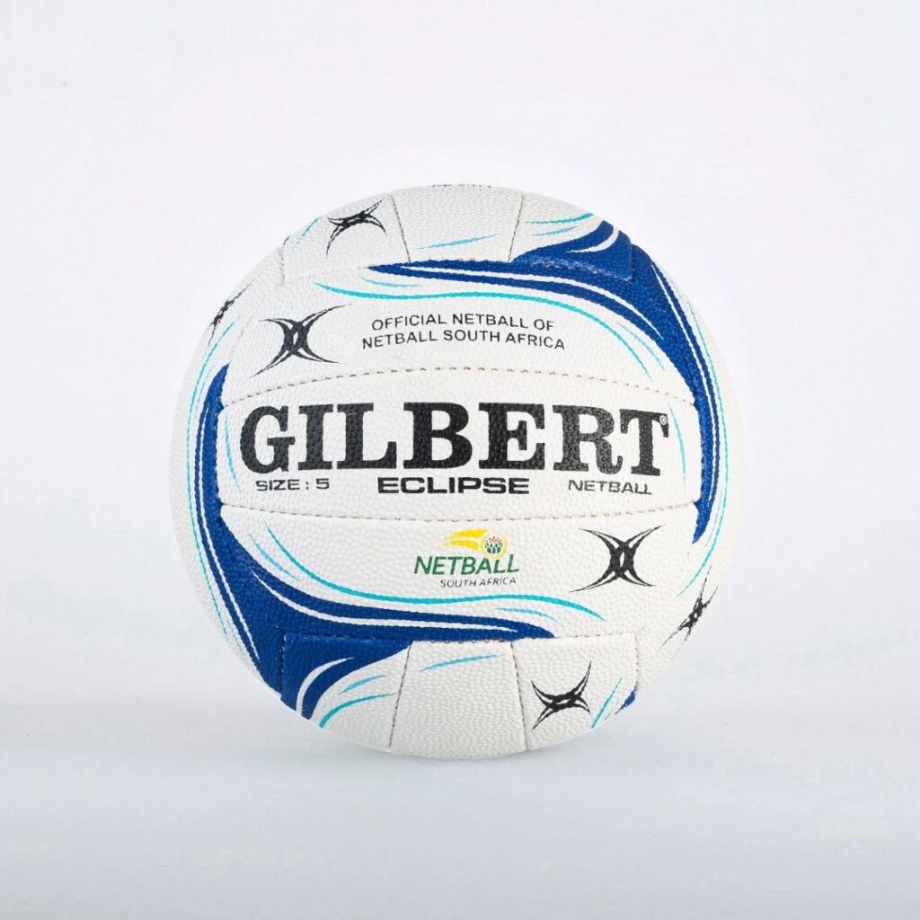 A white and blue Gilbert netball ball with black branding, photographed against a clean white background.

